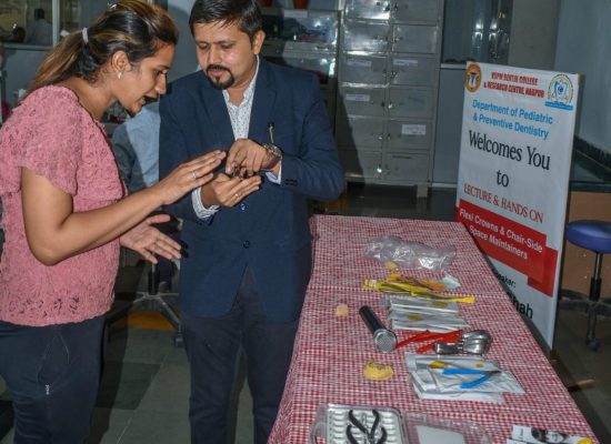 Dr Milind Shah faculty of the CDE explaining the technique to a participant